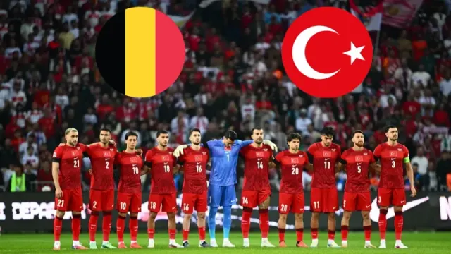 Kırmızı formalı A Milli Takım oyuncuları maç öncesi sahada sıraya girmiş; üstte Belçika ve Türkiye bayrakları